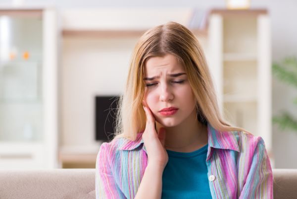 How Poor Posture Contributes To TMJ Pain